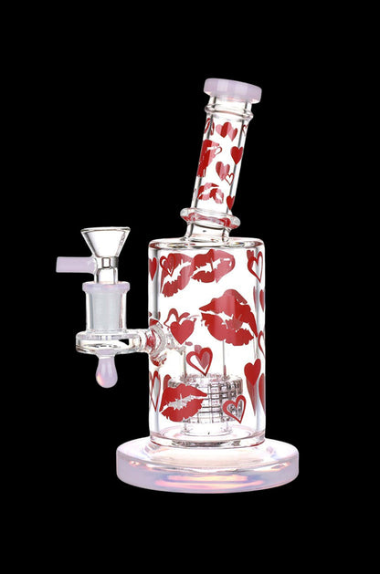 Glass water pipe with red kiss and heart designs.