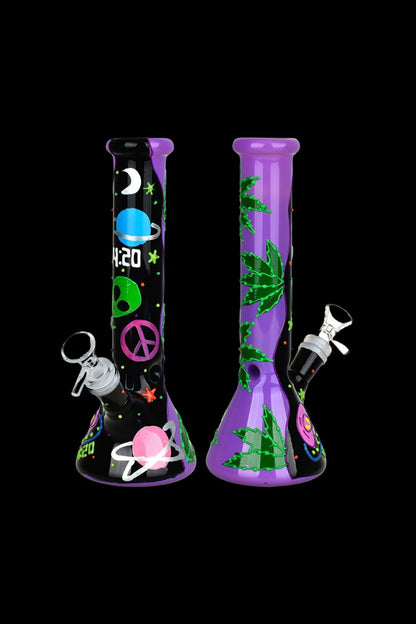 Purple glass bong with cosmic and cannabis-themed decals against a black background.
