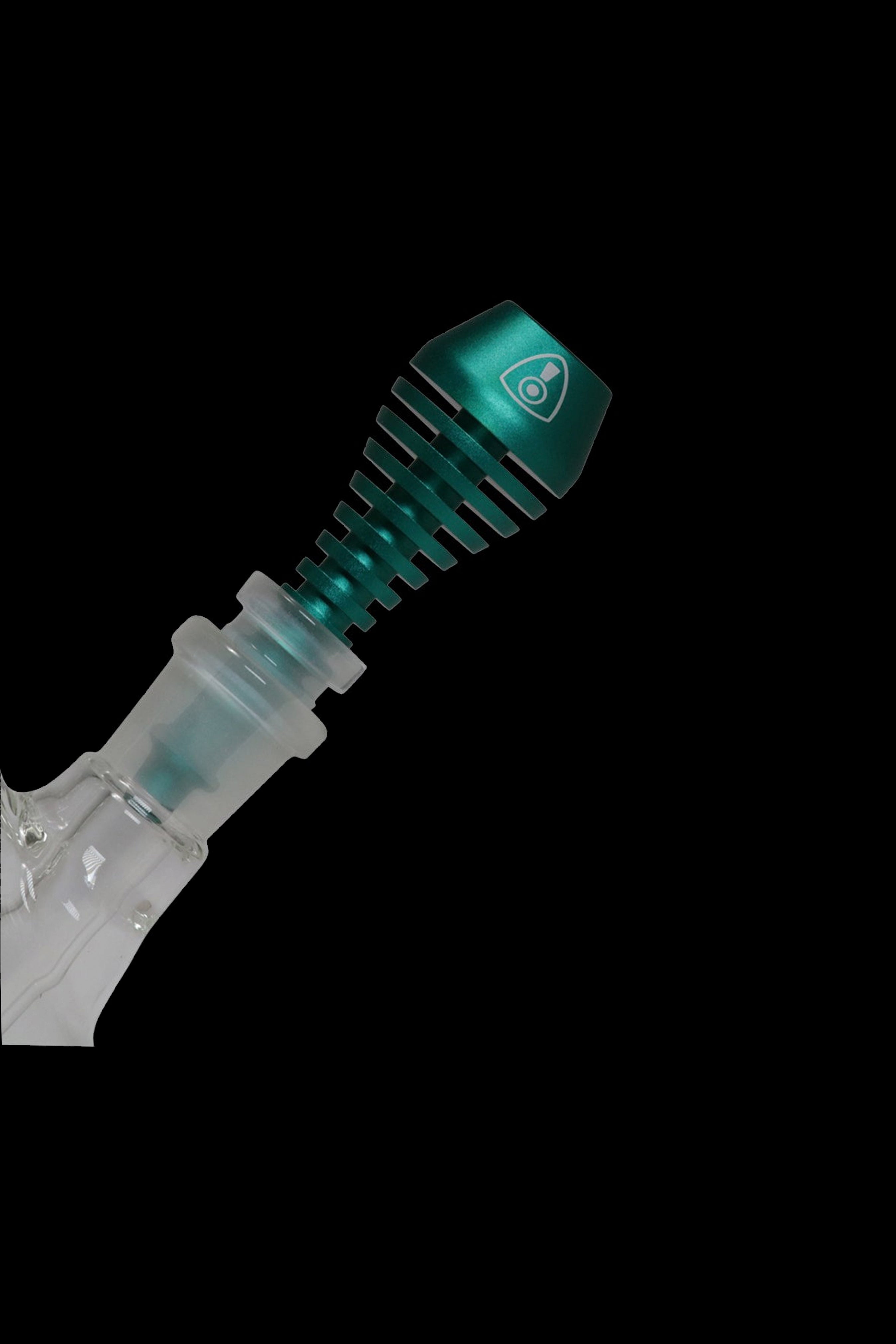 Teal cannabis grinder with visible teeth and chamber.