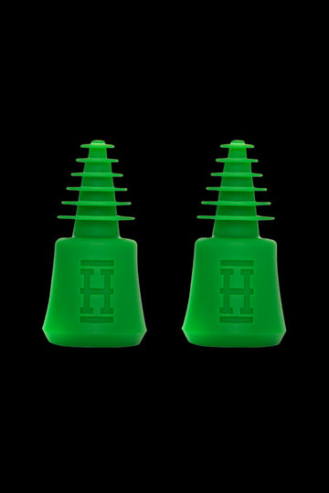 Two green silicone hash oil rig tips for dabbing cannabis concentrates. - Hemper Tech Cleaning Plugs + Caps