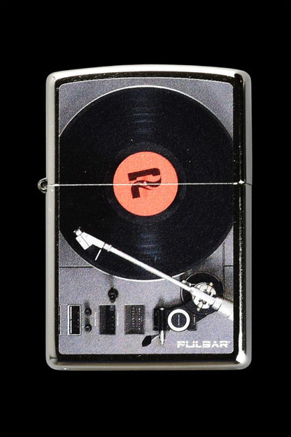 Zippo lighter featuring a vinyl record player design with a red “7” logo, branded “Pulsar.”