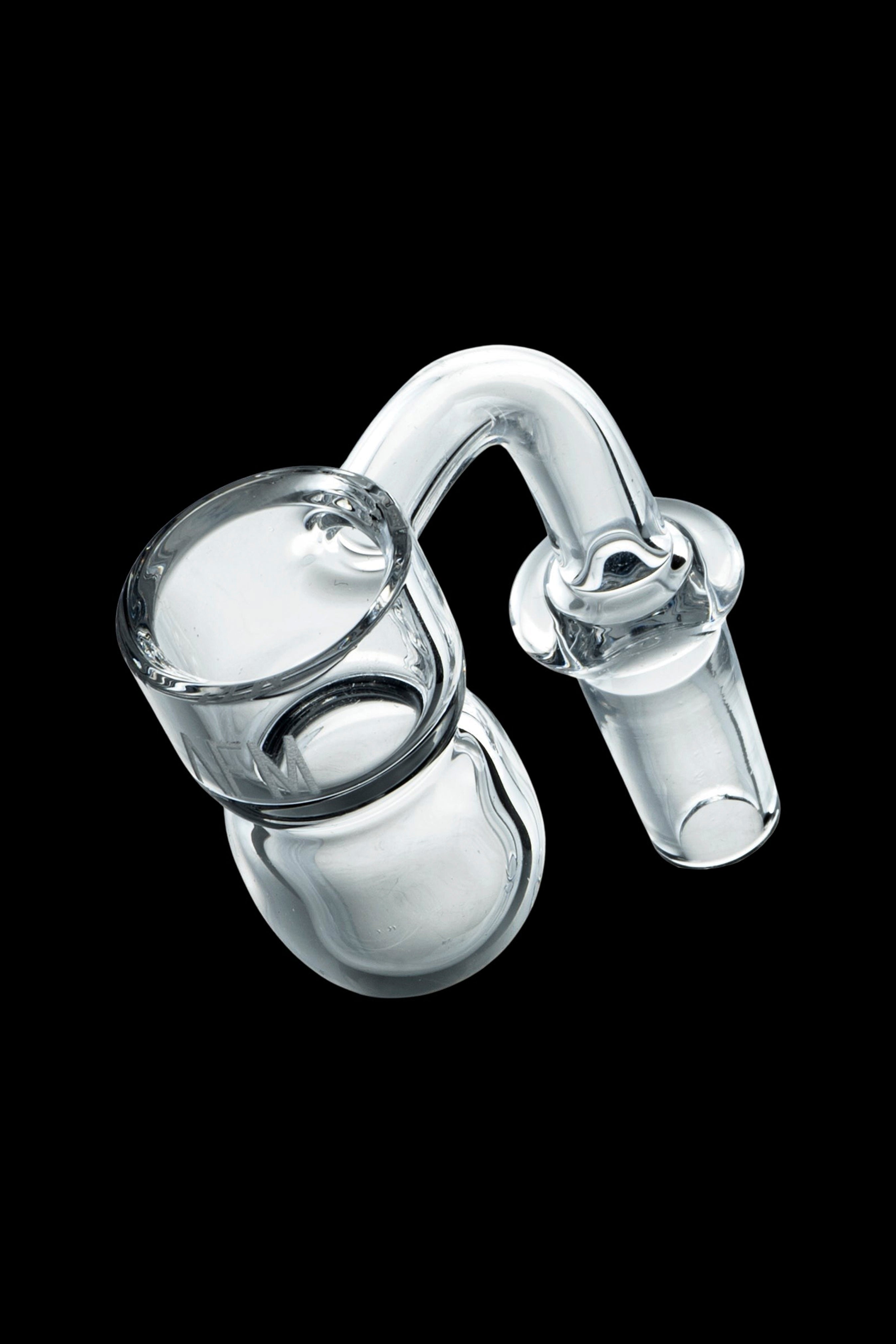 Clear glass dab rig component against a black background.