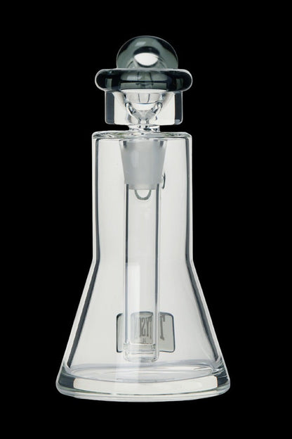 Clear glass dab rig with intricate design and angled mouthpiece.