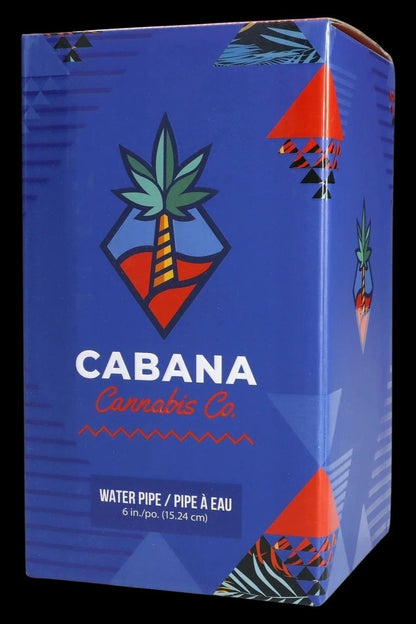 Three-quarter front view of the Cabana Cannabis Co. Ahoy Dab Rig - Teal product box with bold palm-logo graphics on a blue background.