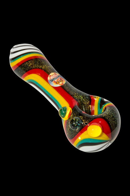 Colorful glass smoking pipe on a black background.