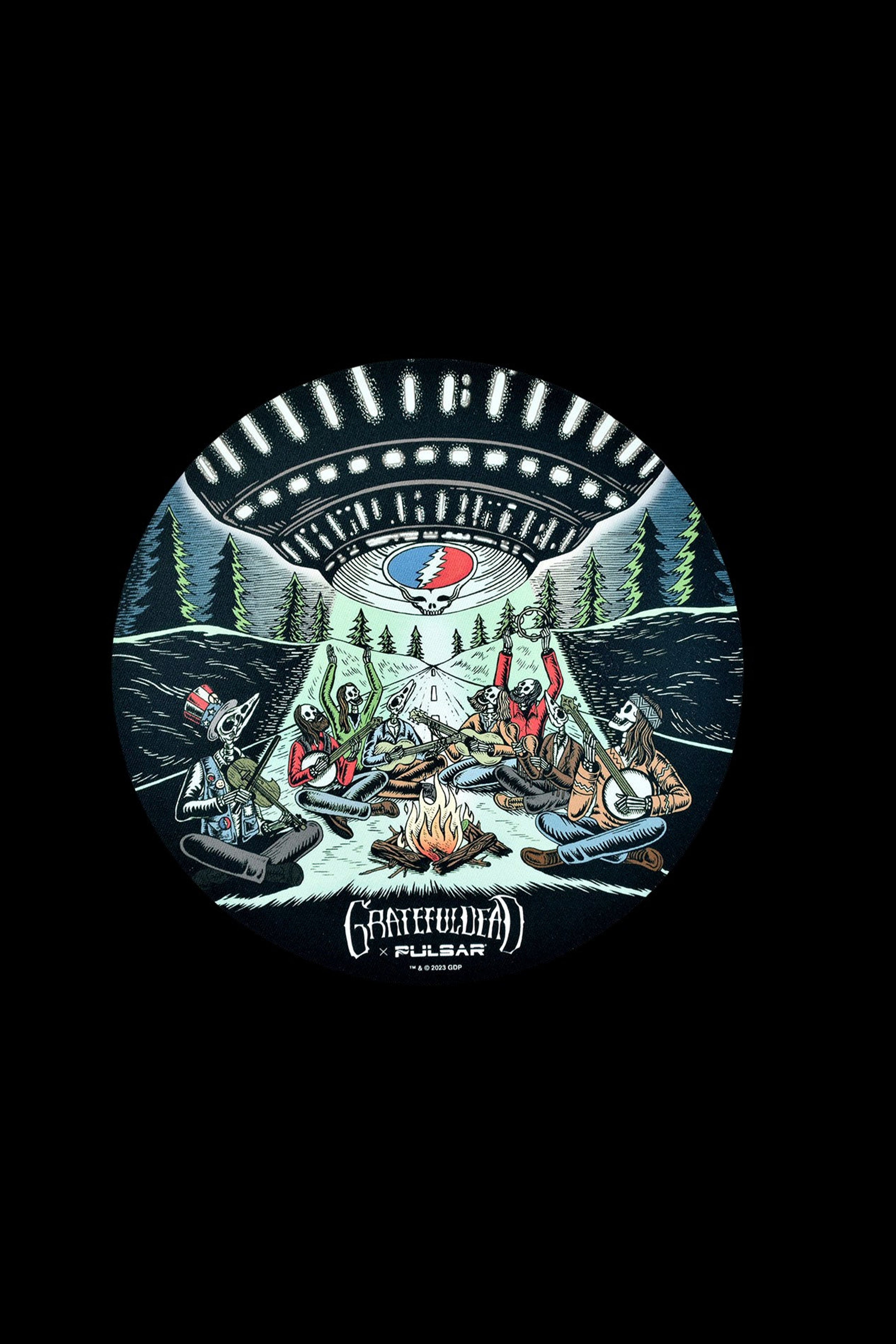 Illustration of skeletons around a campfire in a forest, branded with the Grateful Dead and Pulsar logo, suggestive of cannabis culture."