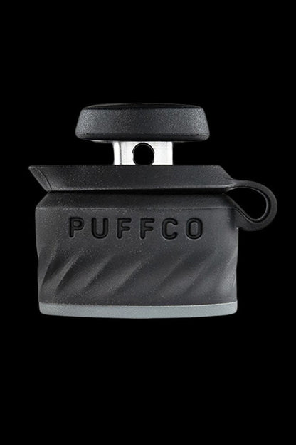 Black Puffco Peak Pro portable dab rig with open container.