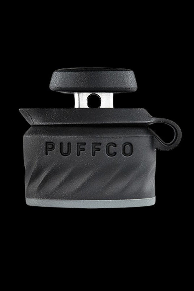 Black Puffco Peak Pro portable dab rig with open container.