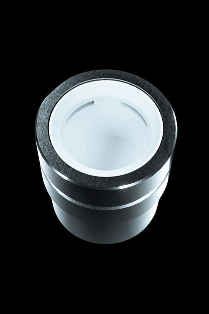 Silver and black cannabis grinder, top view.