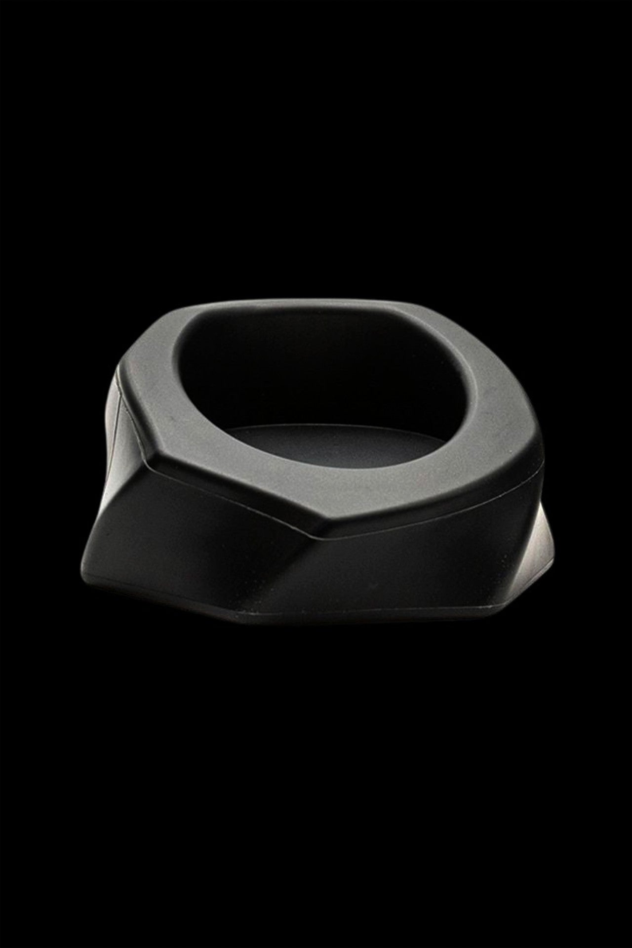 Black cannabis ashtray with a geometric, faceted design.