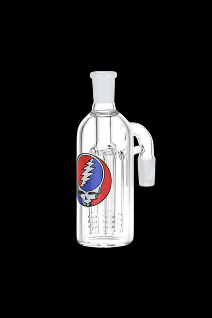 Glass water pipe with a Steal Your Face skull decal, isolated on a black background.