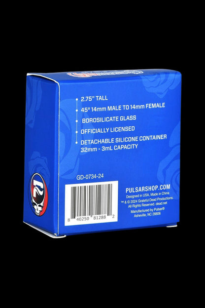 Close-up of a blue and white box for a Pulsar silicone container with product details and a barcode, featuring a Grateful Dead-inspired logo.