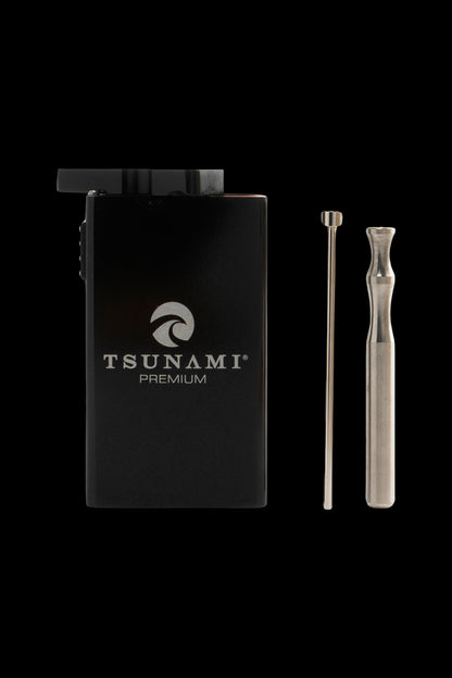 Black Tsunami Premium dab kit with tools against a dark background.