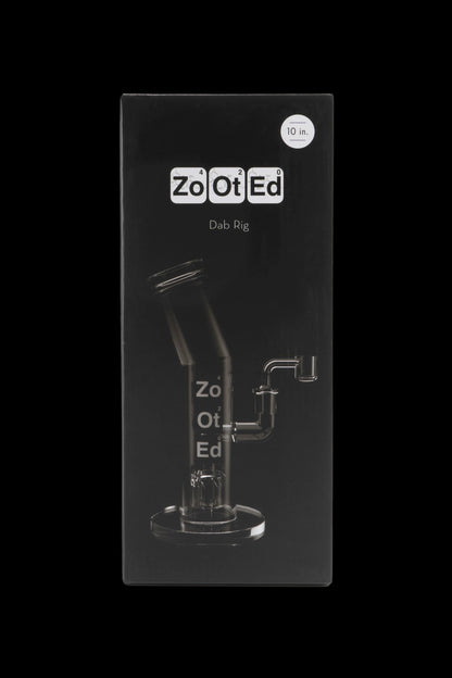 Black box displaying a glass dab rig with "Zo Ot Ed" branding and "10 in." sticker.