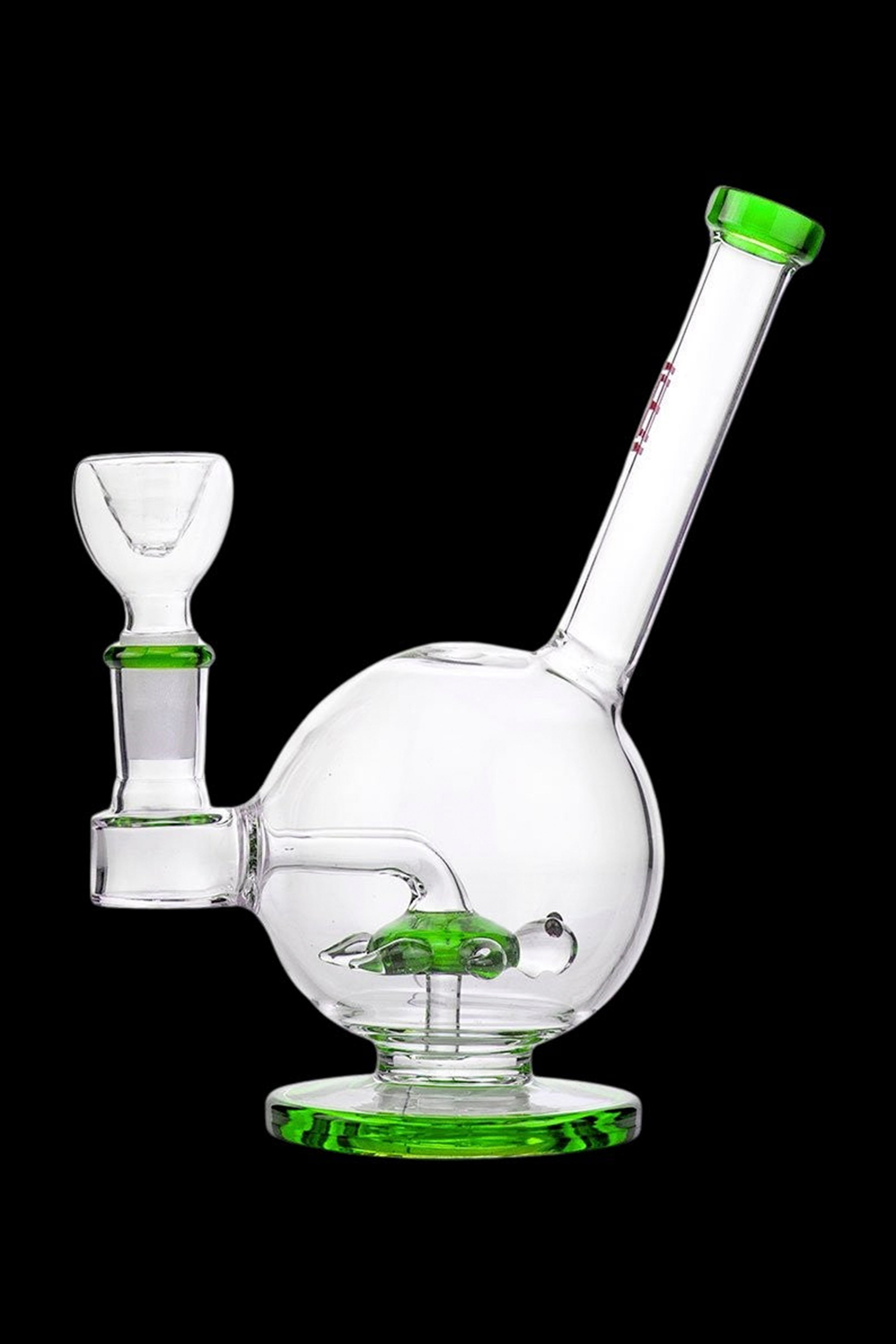 Clear glass bubbler water pipe with green accents.