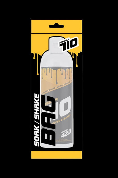 A yellow spray can of “BFG 10” cannabis accessory cleaner with dripping liquid.
