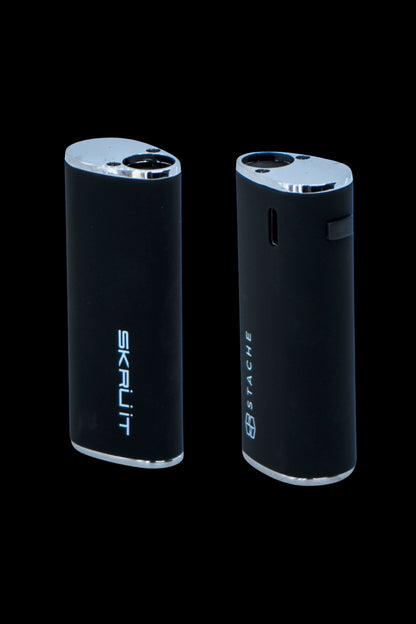Two black Skruut and Stache cannabis vaporizers on a dark background.