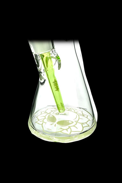 Green glass bong with intricate etched designs.