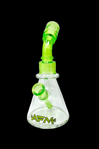 Green glass water pipe with a flared base and ice catcher.
