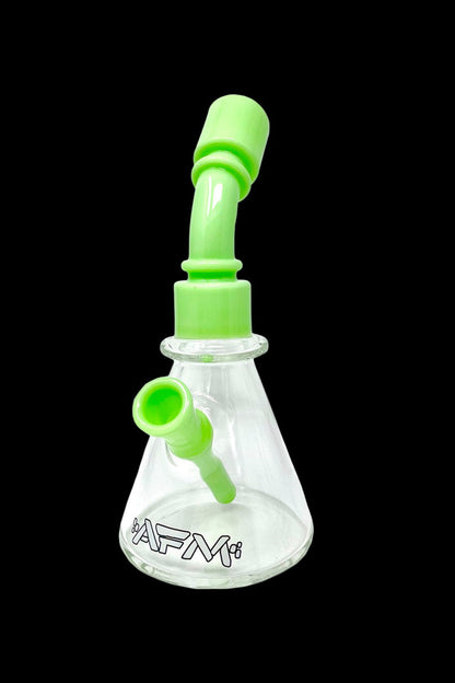 Green glass water pipe (bong) with a clear base and branded lettering.