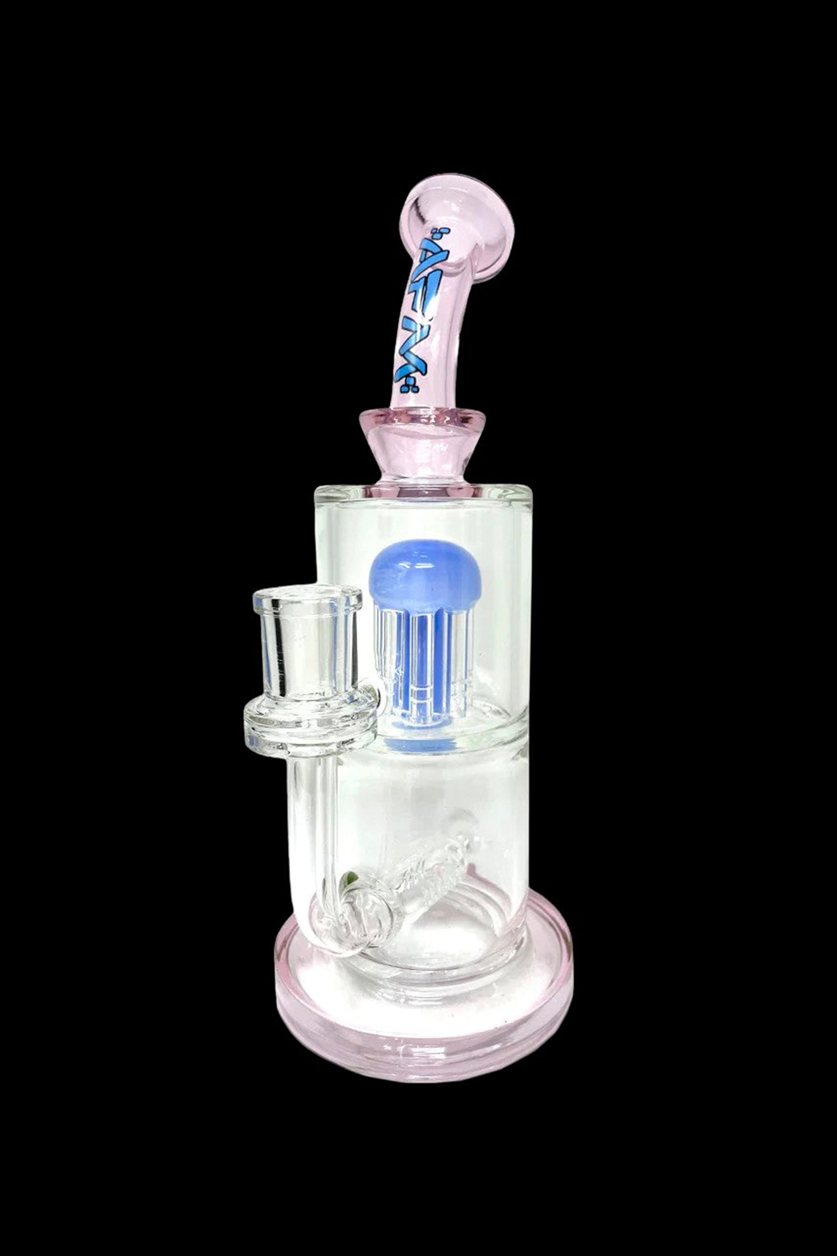Pink glass bubbler with intricate blue glasswork and a mouthpiece.