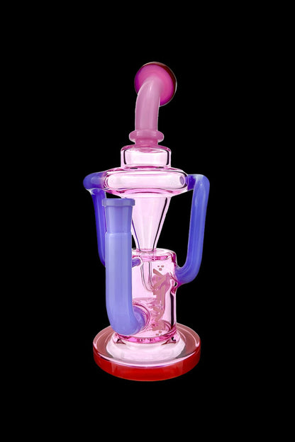 A colorful glass dab rig with a unique looped design, featuring pink, purple, and blue hues.