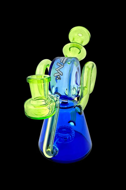Blue and green glass water pipe (rig) with intricate curves and bubble details.