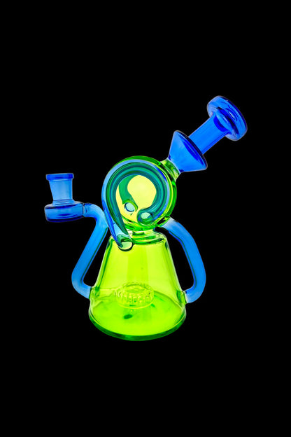 Green and blue glass water pipe (rig) isolated on a black background.
