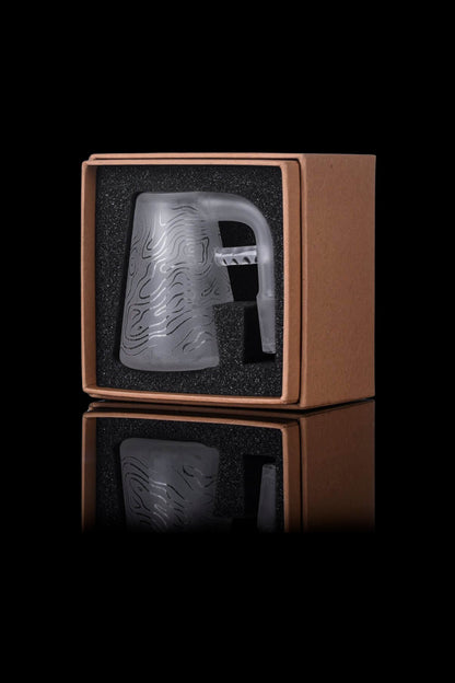 Metal cannabis pipe presented in a brown gift box with reflective surface.