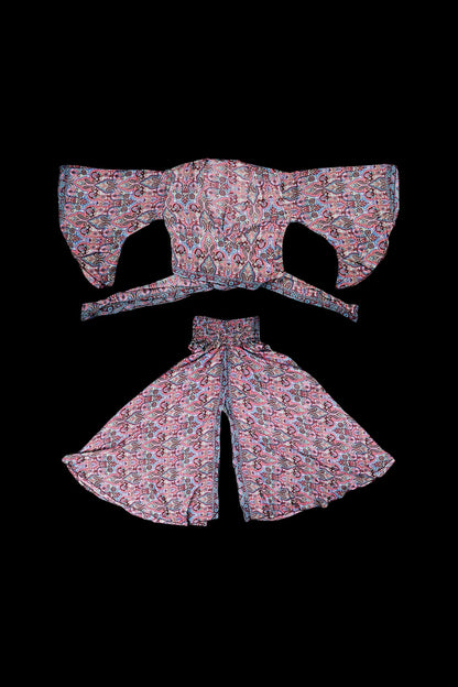 Floral patterned two-piece set – crop top and wide-leg pants – likely intended as festival or cannabis-lifestyle wear.