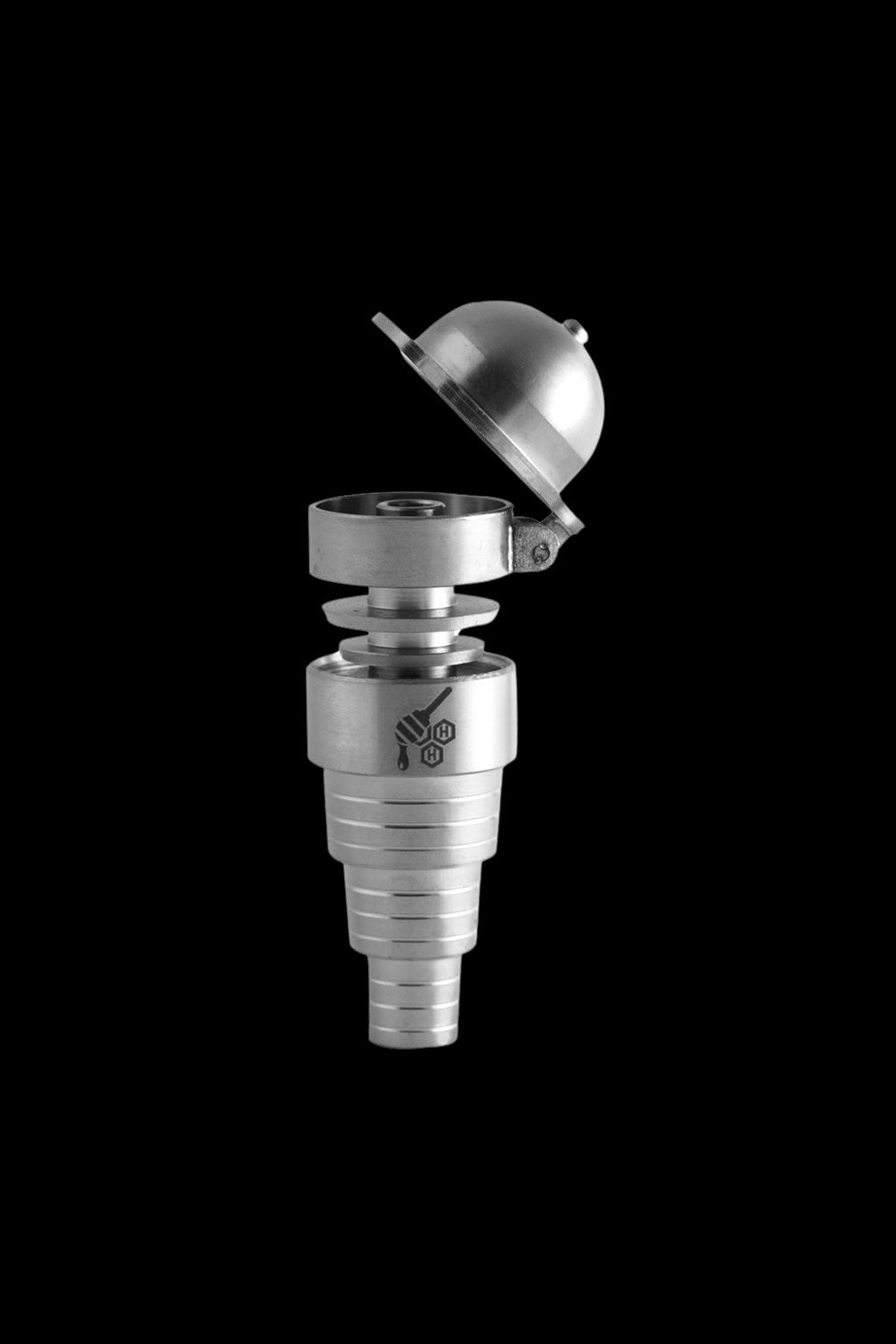 Silver cannabis concentrate dab nail with a carb cap, isolated on a black background.