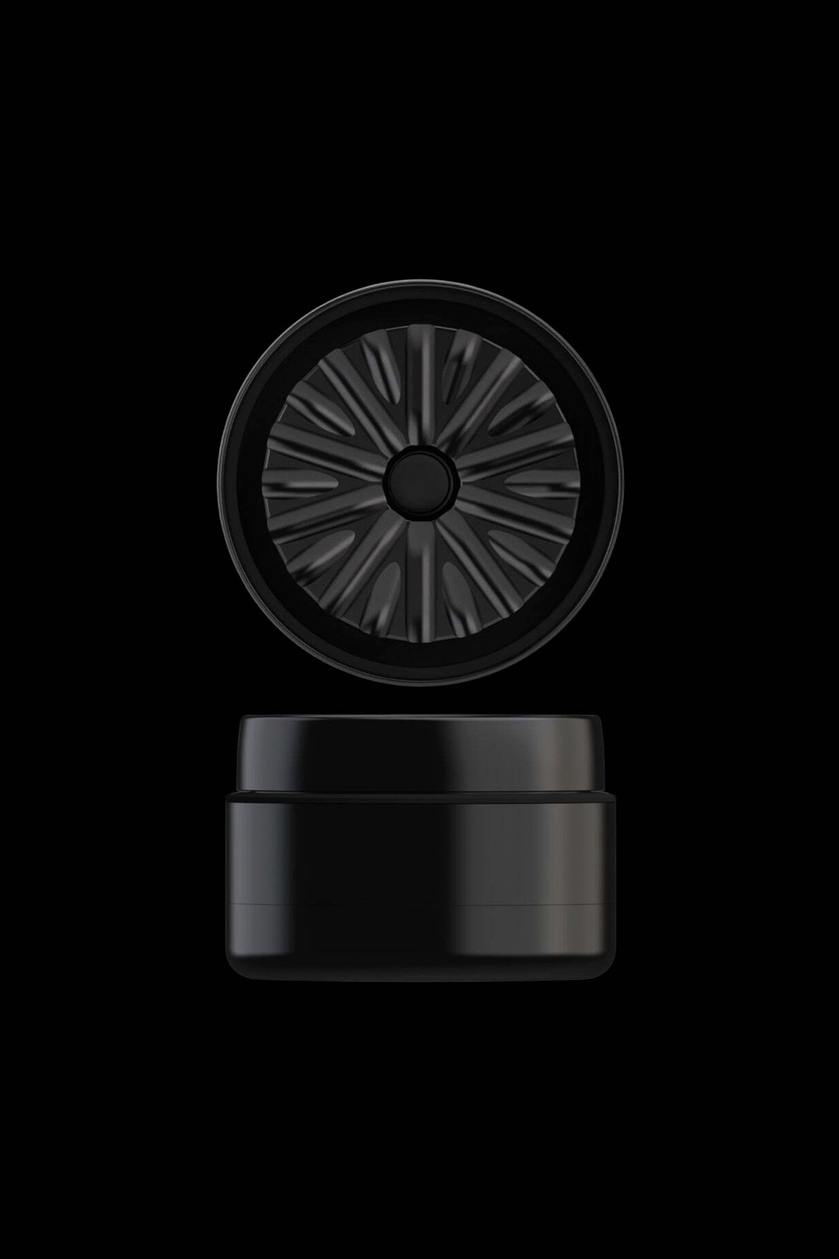 Black cannabis storage jar with a grated filter lid.