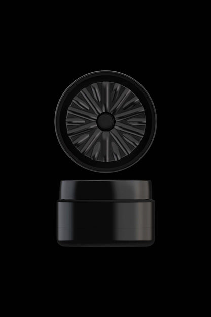 Black cannabis storage jar with a grated filter lid.