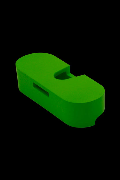 Green cannabis pipe bowl.