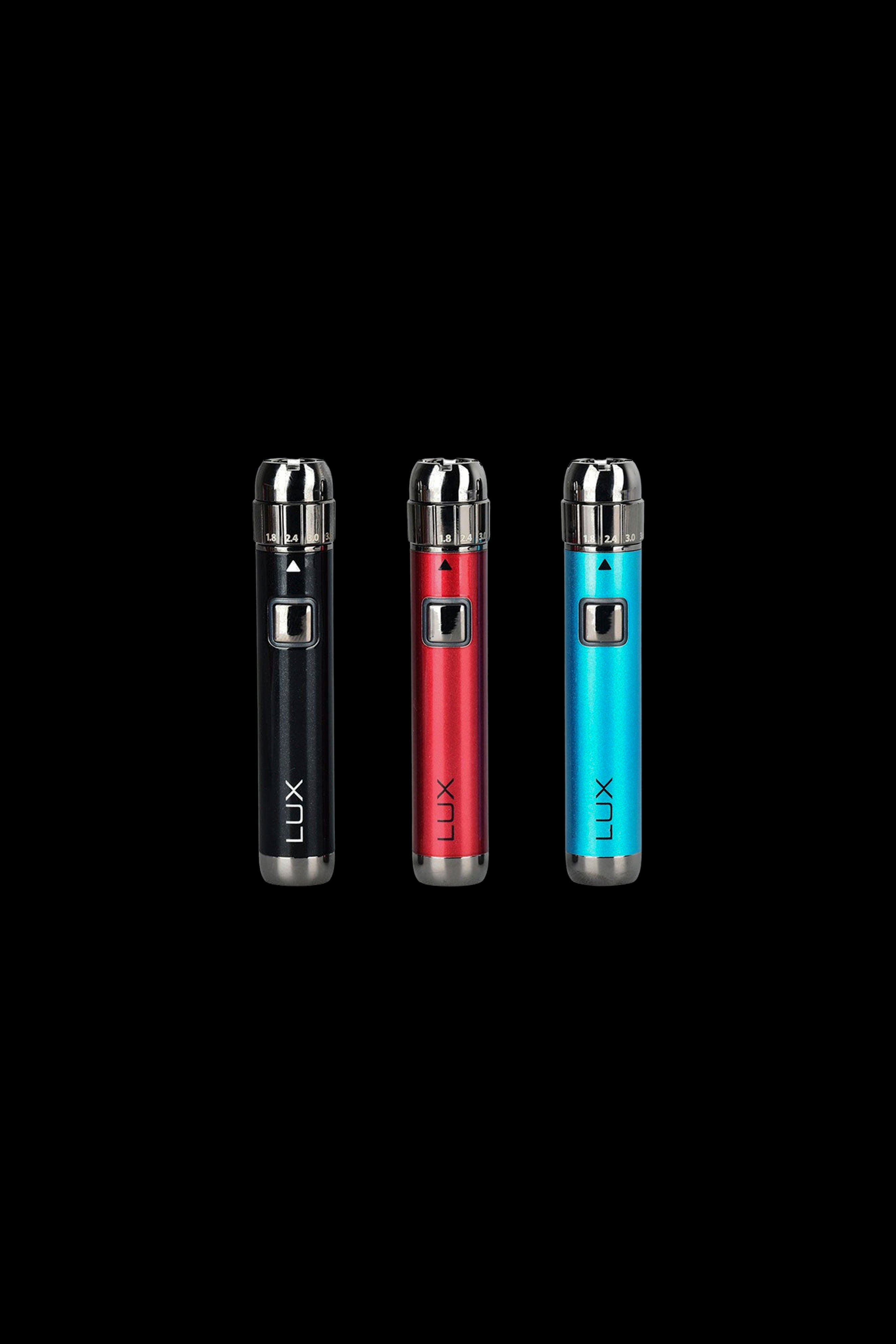 Three sleek, metallic cannabis vape pens – black, red, and teal – displayed against a black background. Each pen is branded with “LUX.”