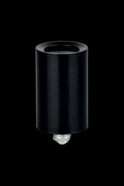 Black cannabis oil vape cartridge against a black background.