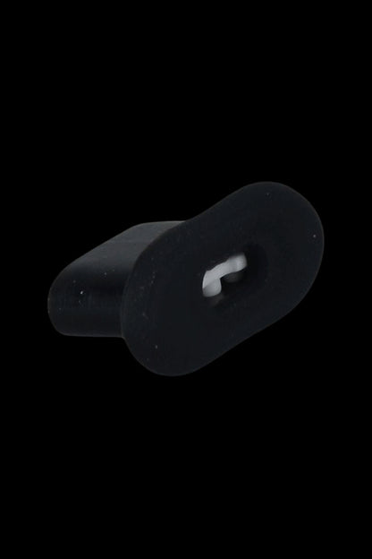 Black silicone cannabis carb cap with a directional airflow insert.