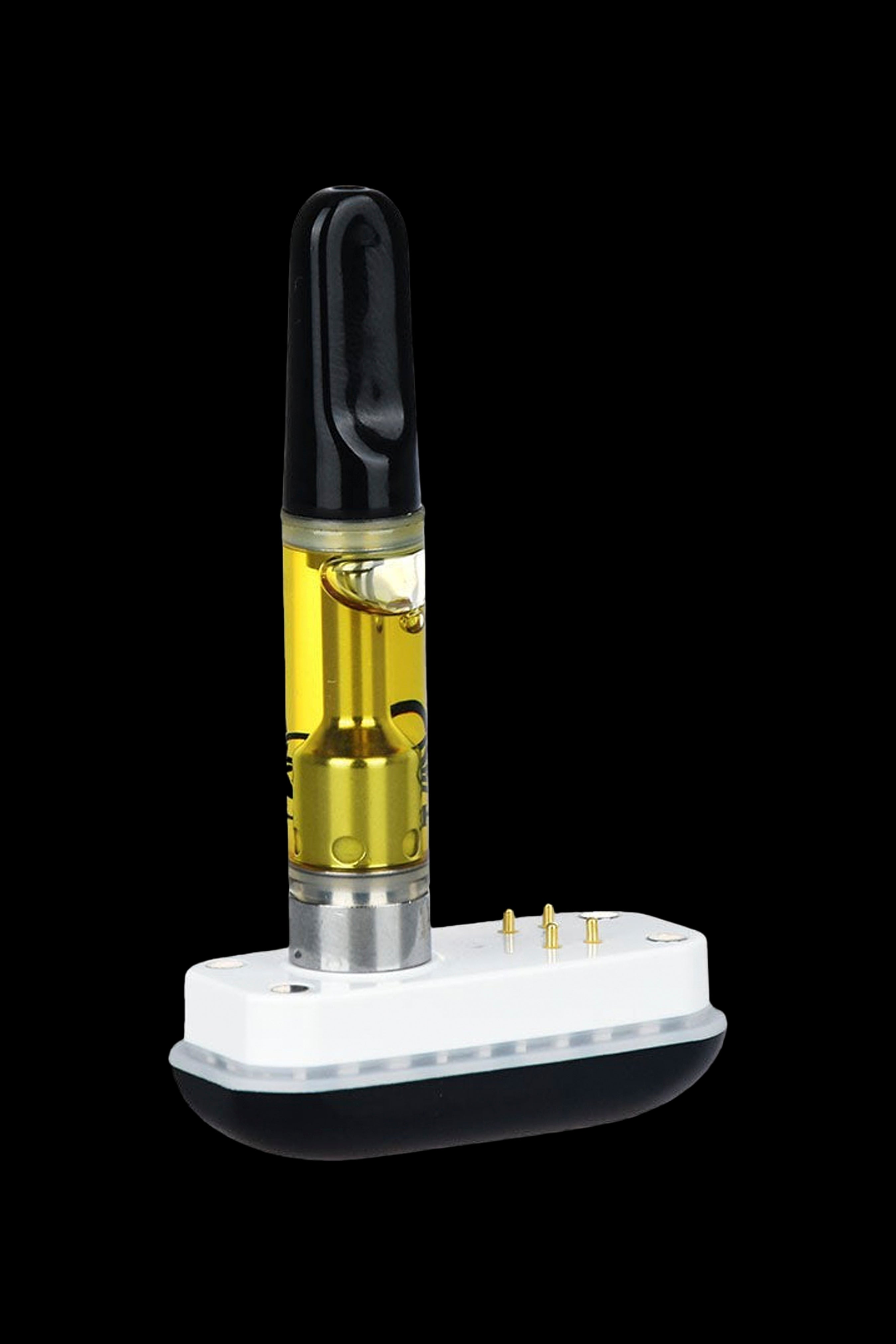 Cannabis oil vape cartridge with magnetic connector.