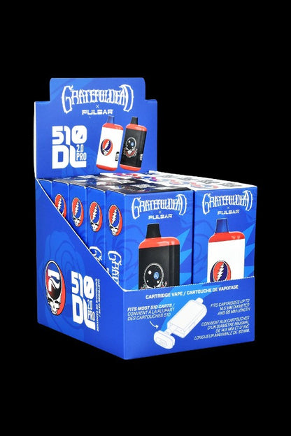 A stack of boxed Pulsar ""510 Duo Pro"" cannabis oil vape cartridges featuring Grateful Dead-themed branding."
