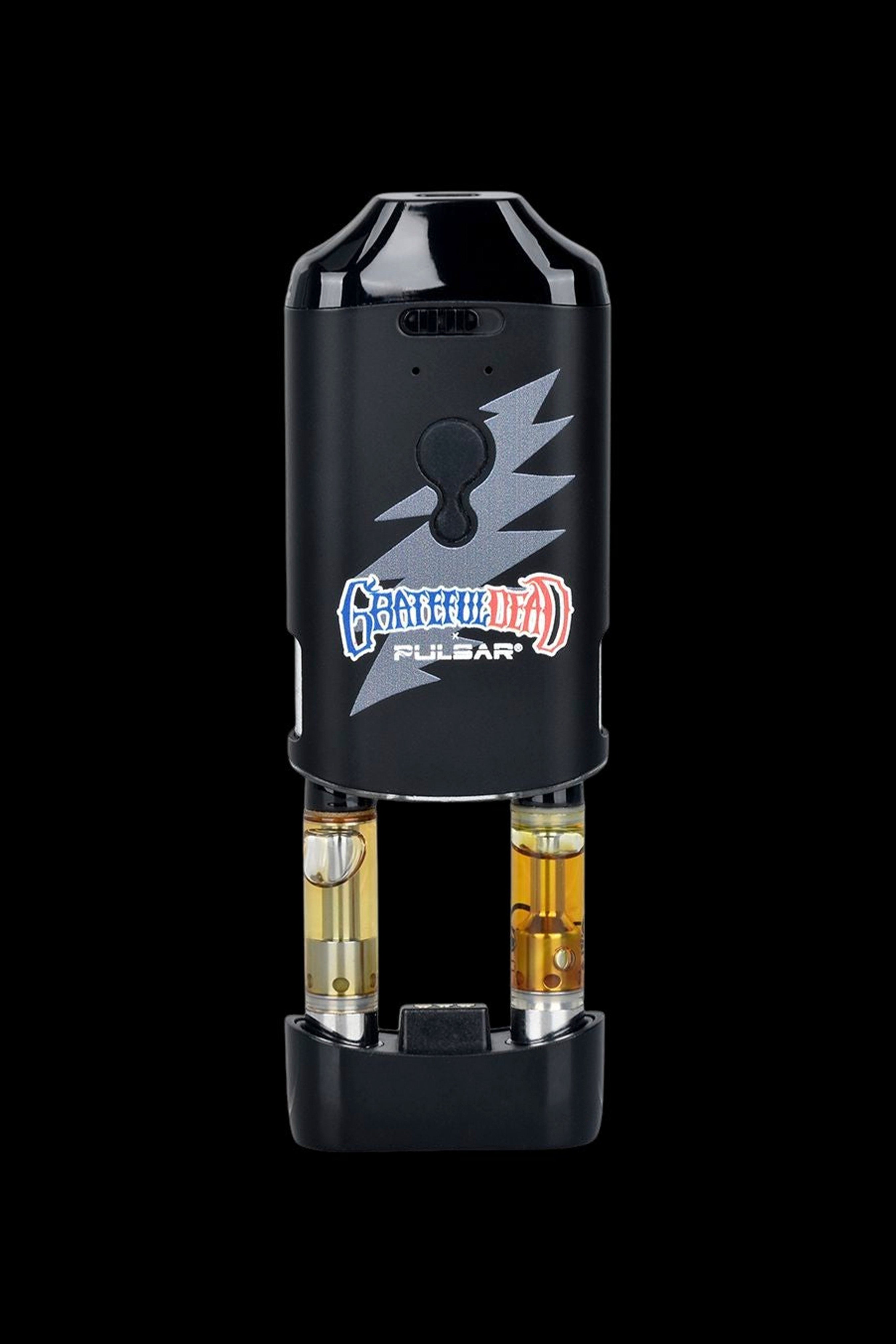 Black Pulsar vaporizer with two filled cannabis oil cartridges inserted.