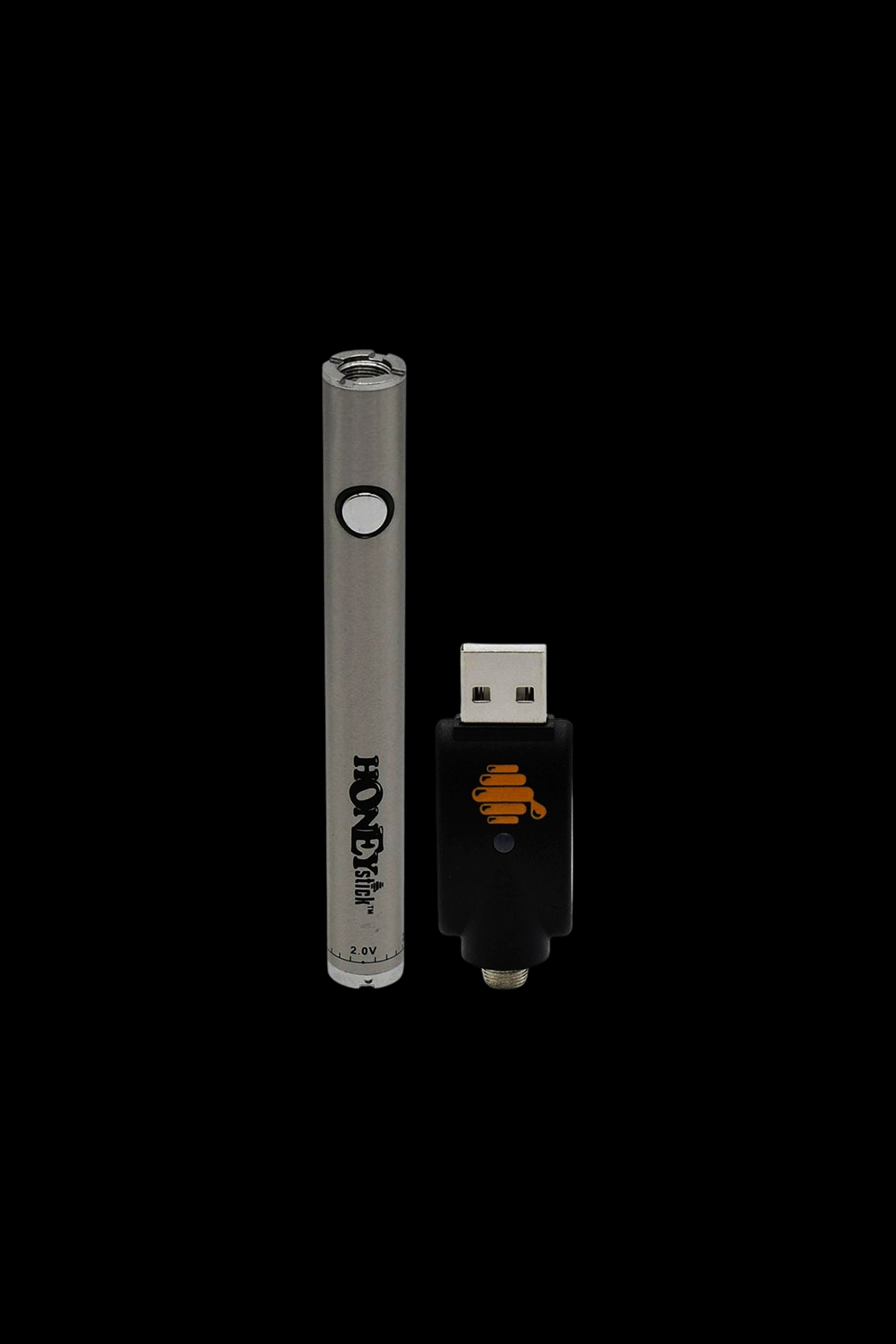 Silver Honesty Stick vape pen and USB charger with orange branding.