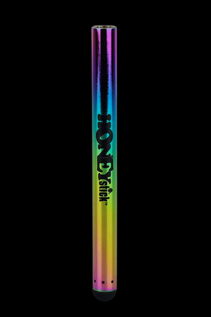 Iridescent cannabis oil vape pen with “Stick” branding against a black background.