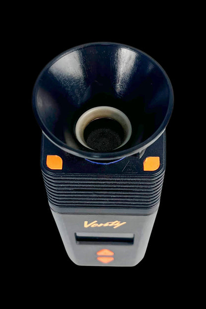Top-down view of the Venty Vaporizer Herb Funnel mounted on a black vaporizer body with orange accent buttons.
