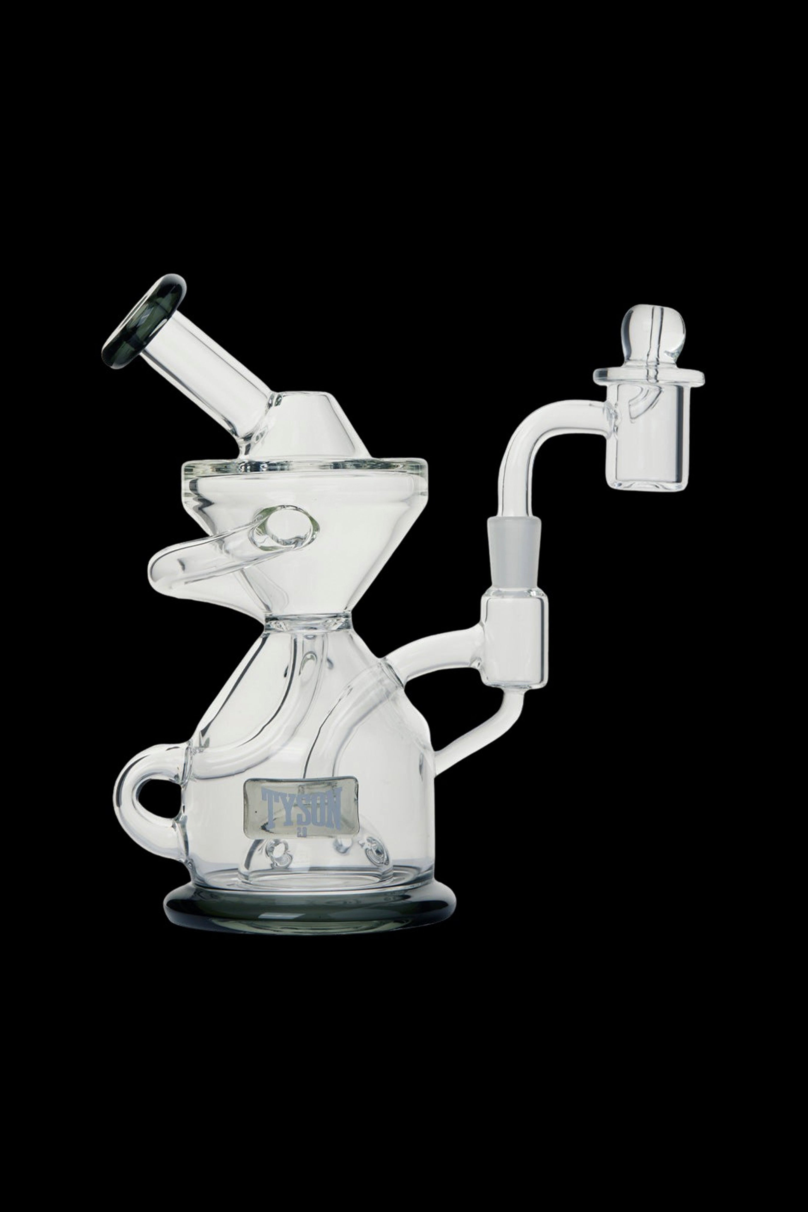 Clear glass dab rig with intricate percolator and mouthpiece, isolated on a black background.