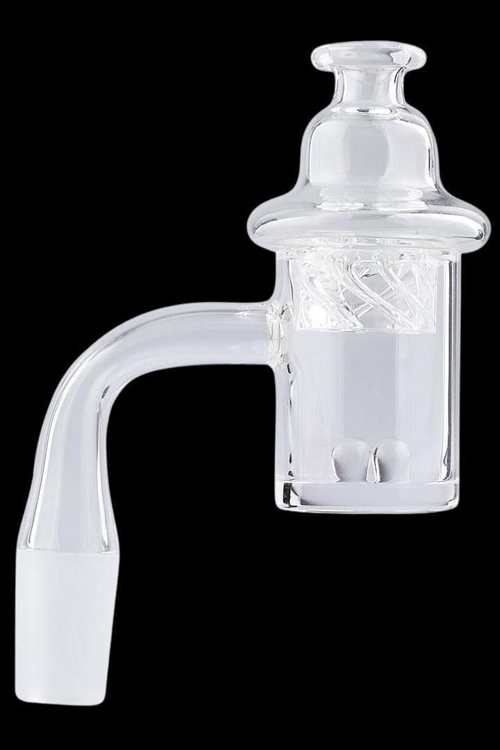 Clear glass dab rig carb cap with intricate internal design.