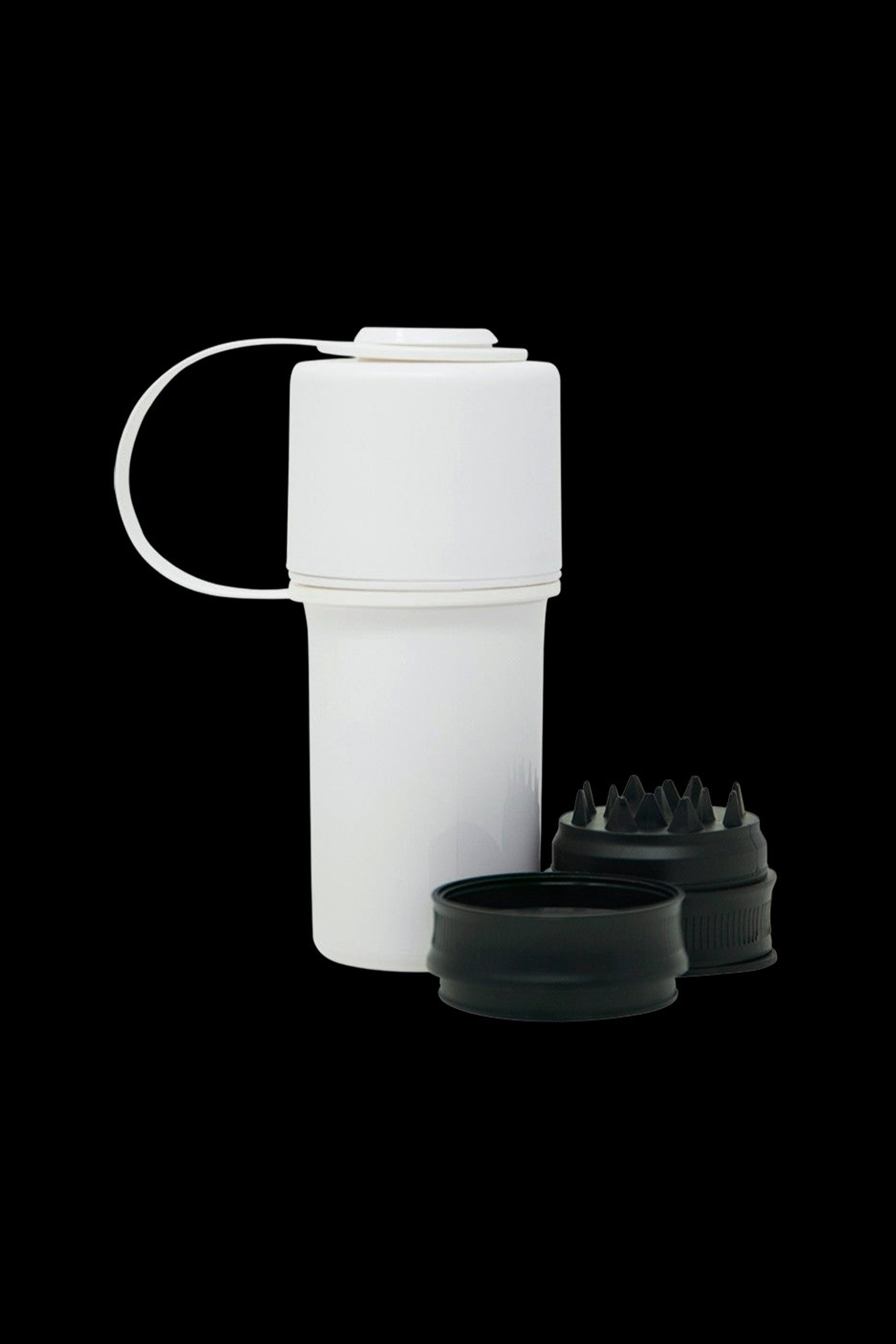 White grinder with removable internal grinding components and collection chamber.