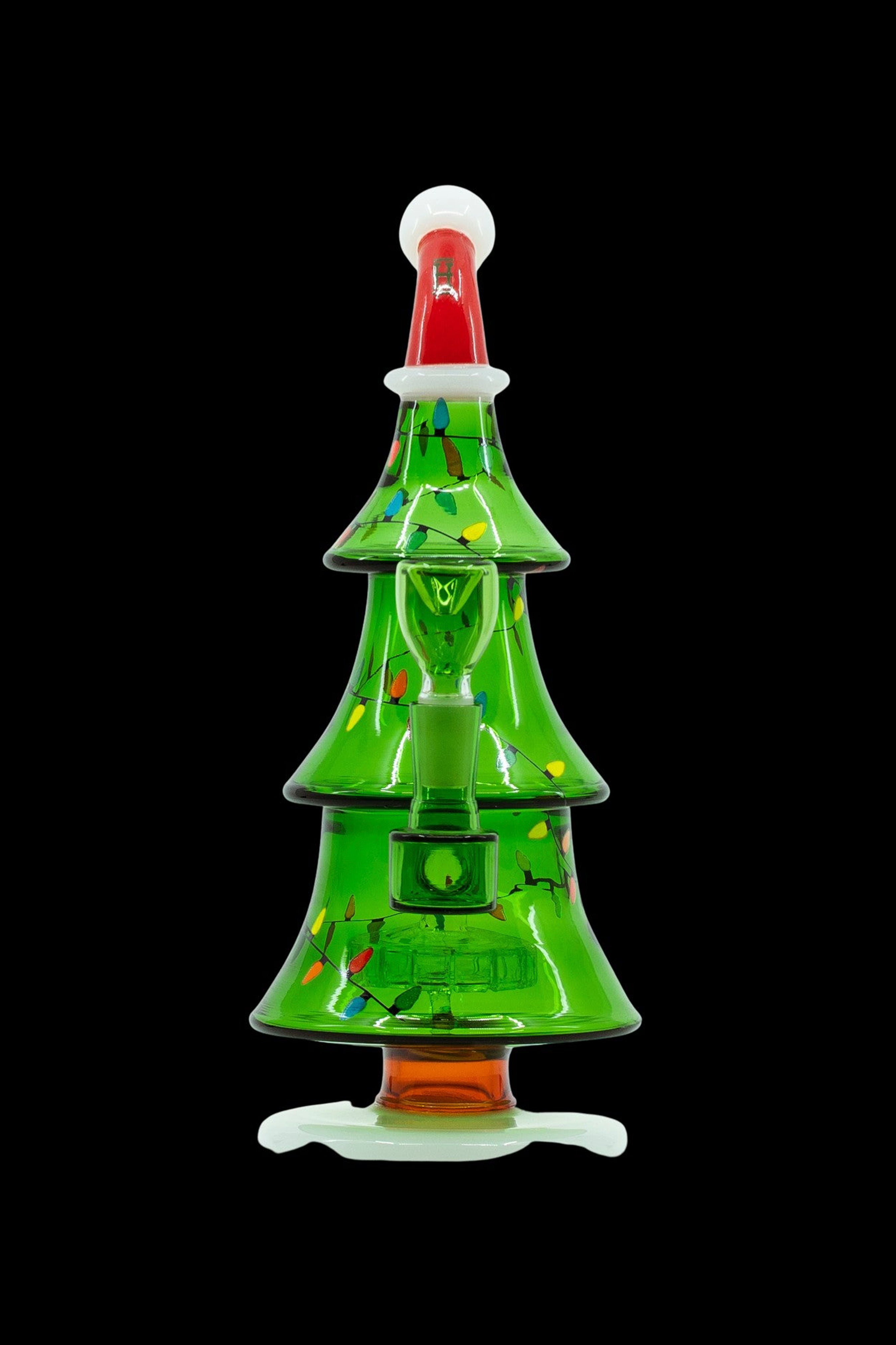Green glass water pipe shaped like a Christmas tree with colorful lights and ornaments.