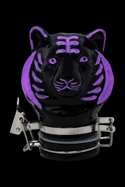Black glass bubbler with a purple tiger face design, secured with metal clamps.