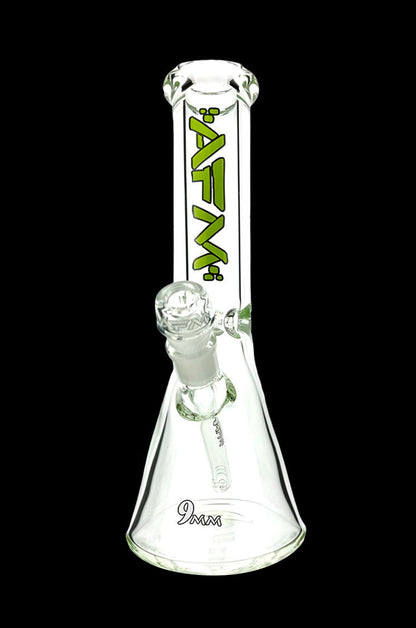 Clear glass bong with green lettering and a flared base.
