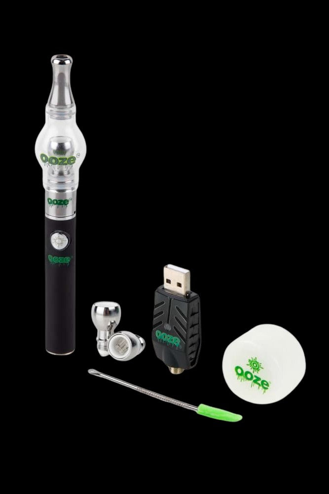 Ooze cannabis vape pen kit with charging accessories and tools.